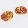 Two Golden Brown Swirled Bread Loaves With Almond Slices On White Background