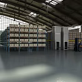 Large Warehouse Interior Featuring Metal Shelves Stacked Boxes Forklift High Ceiling And Natural Light