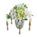 White And Green Hydrangea Flowers In Glass Vase With Gold Candle Holders