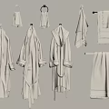Soft Beige Towels and Bathrobes Hanging on Wall Hooks and Racks