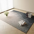 Square Rug With Mountain Pattern On Light Wood Floor White Flower Vase And Open Magazine