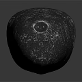 Black Stone Sculpture With Intricate Glowing Green Pattern And Decorative Design