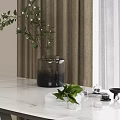 Dark Vase With Eucalyptus Leaves On White Marble Countertop By Sheer Curtains And Natural Light