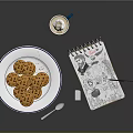 Steaming Blue Mug With Tea Bag Cookies On White Plate Notebook Pen And Spoon