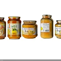 Assorted Honey Yuzu And Lemon Tea Drinks In Glass Jars