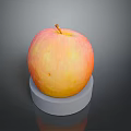 Fresh Ripe Red and Yellow Apple on White Circular Base Against Dark Background