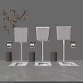 Three Modern Squat Toilets with White Tanks Brown Trash Bins and Toilet Paper Holders