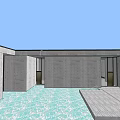 Modern Concrete Building Exterior With Large Windows Balconies And Green Lawn