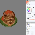 Delicious Stack of Pancakes with Orange Toppings and Nuts on Green Plate