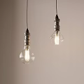 Vintage Glass Pendant Lights With Metal Bases Hanging In Minimalist Room