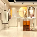 Elegant Clothing Store Interior With Mannequins Display Tables And Fashion Decor