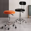 Orange and Black Adjustable Rolling Stools with Chrome Bases in Modern Interior 3d model
