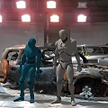 Three Colored Human Figures Standing Near Burned Old Car Outdoor Scene