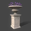 Purple Flowering Plants In Decorative Stone Planter On Pedestal Base