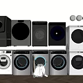 Different Styles And Colors Of Washing Machines Neatly Arranged With Clothes In Front