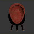 Red Patterned Oval Shaped Chair With Wooden Legs And Golden Accents