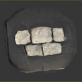 Five Gray Natural Stone Pieces Neatly Arranged On Dark Wooden Tray