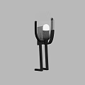 Modern Black Metal Wall Sconce with Transparent Glass Shade and Illuminated Bulb