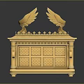 Golden Ornate Chest With Wing Decorations And Intricate Carved Patterns On Reflective Base