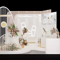 Modern Liquor Store Exhibition Booth With White Arched Structures Green Plants And Displayed Bottles
