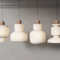White Woven Modern Pendant Lights With Brass Base Against Gray Wall Interior Design