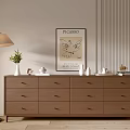 Modern Console Cabinet Sideboard with Floor Lamp Decorative Items and Picasso Poster on Light Colored Wall