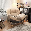Plush Beige Single Seater Rocking Sofa With Gray Blanket In Cozy Living Room
