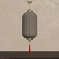 Traditional Beige Lantern With Pleated Design Golden Decorations And Red Tassel On Beige Wall Background