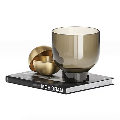 Golden Spherical Sculpture with Transparent Glass Vessel on Black Decorative Book 3d model