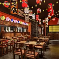 Japanese Style Restaurant Interior With Red Lanterns Daruma Decorations Wooden Tables and Chairs