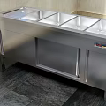 Cafeteria Stainless Steel Food Serving Counter With Multiple Compartments And Cabinets
