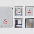 Different Electrical Distribution Boxes With Warning Signs And Internal Components