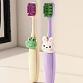 Children's Toothbrushes With Cute Dinosaur And Rabbit Designs Yellow Purple Handles Daily Cleaning