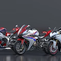 Sleek Sport Motorcycles With Red White And Blue Stripes Lined Up On Shiny Surface