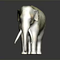 Green Brown Elephant Sculpture With Long White Tusks And Dark Background