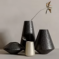 Textured Black And Cream Vases With Leafy Branch In Minimalist Interior