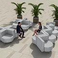 Modern Outdoor Public Chairs with Striped Design Green Plants and People Sitting on Stone Floor