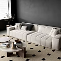 Modern Beige Velvet Sofa with Pillows and Wooden Coffee Table Set on Geometric Rug