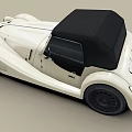 Vintage Cream Colored Convertible Car With Black Top And Classic Design