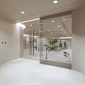Modern Fashion Clothing Store Interior With Mirrors Plants And Display Area