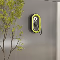 Modern Charging Stations On Gray Wall With Green Plant In Interior