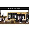 Guexell Clothing Store Interior With Fashion Displays Mannequins And Shelves