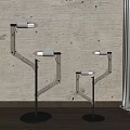 Modern Three Floor Lamps With Minimalist Metal Frame And White Lamp Heads In Indoor Living Space