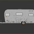 White Vintage Travel Trailer with Striped Exterior Windows and Classic Wheels Design