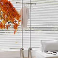 Freestanding Metal Clothes Hanger Indoor With Green Plant Window Blinds And Wooden Floor