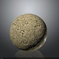 Detailed Wooden Stone Sphere With Intricate Carved Patterns And Natural Textured Surface