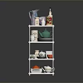 White Multi Tier Kitchen Storage Rack With Teapot Cups And Bottles