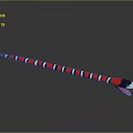 Red Black White Striped Snake With Tongue Sticking Out On Shiny Gray Surface