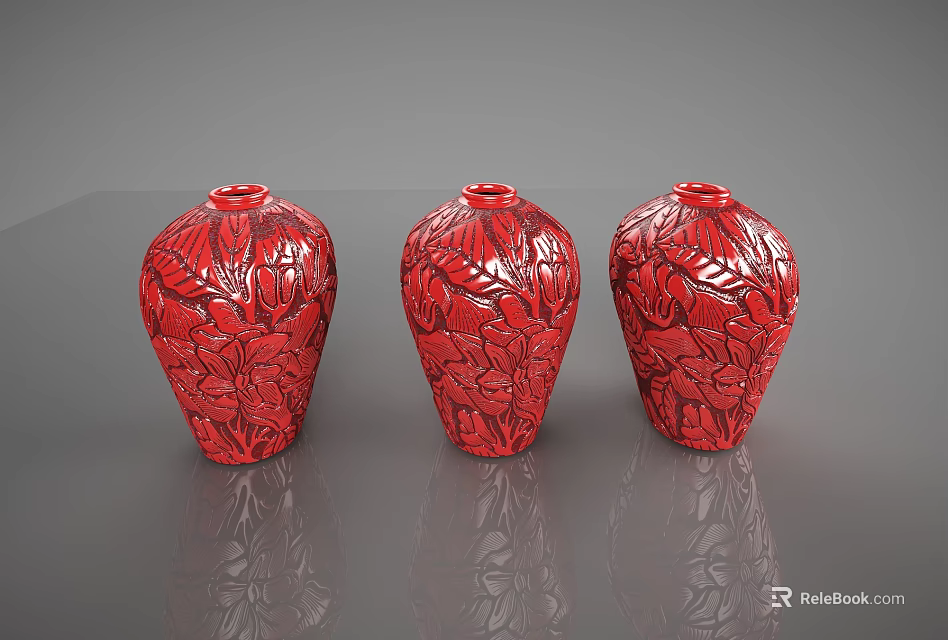Three Red Ceramic Vases With Intricate Carved Flower Patterns For Decorative 3d model