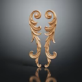 Golden Symmetrical Sculpture Carving with Curved Leaf Decorative Patterns on Dark Background with Reflection
